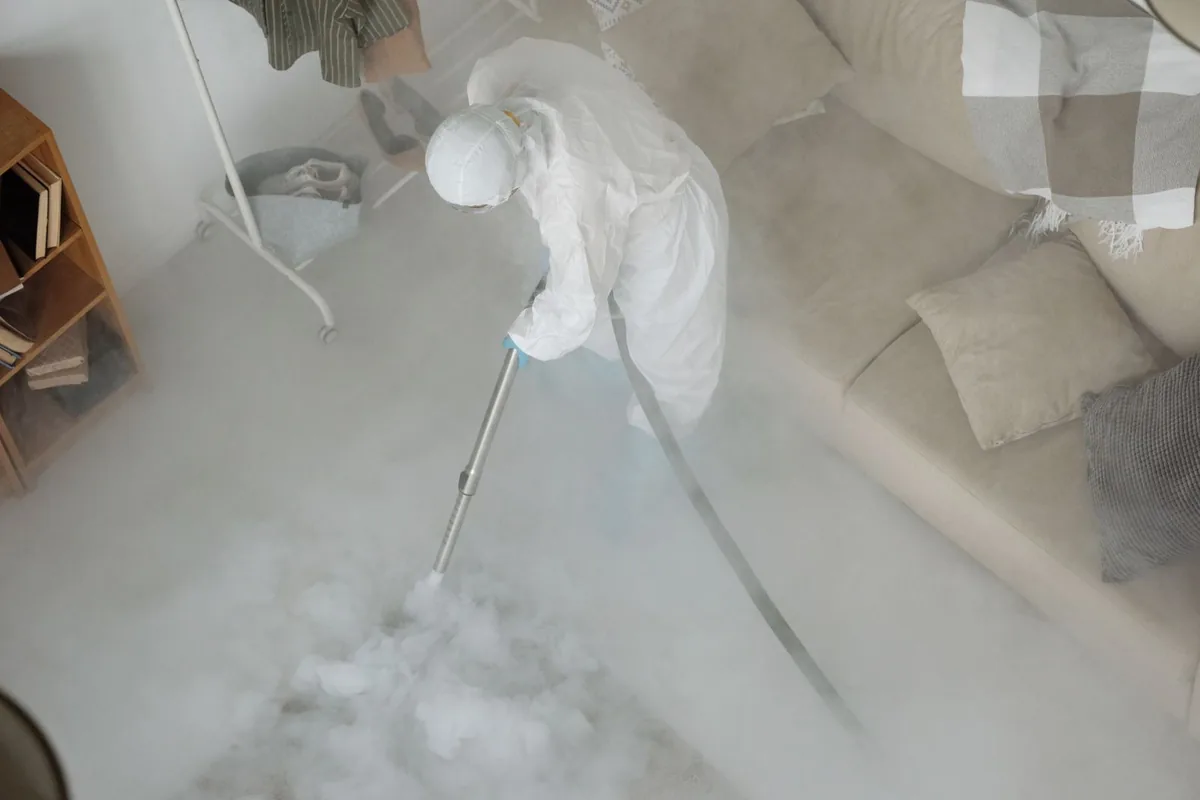Biohazard cleanup technician in protective equipment, Cottage Grove, WI